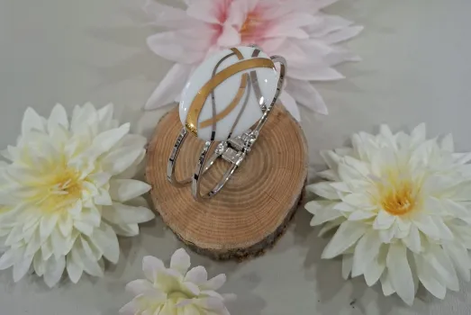 BRACELETS MANCHETTES REFLET OVALE OR/PLATINE